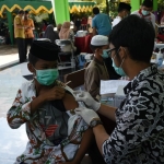 Vaksinasi Cegah Lonjakan Covid-19