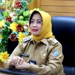 Bupati Erlina Berikan Materi Simposium Nasional