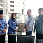 Bupati Erlina Doakan Karir Wendi Isnawan Semakin Sukses