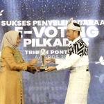 Pelaksanaan E-Voting Pilkades Mempawah Diganjar Penghargaan