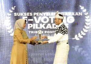 Pelaksanaan E-Voting Pilkades Mempawah Diganjar Penghargaan