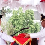 Wabup Pagi Pimpin Penurunan Bendera Merah Putih
