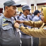 Bupati Erlina Kukuhkan Satlinmas Desa dan Kelurahan