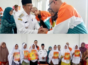 Pj Bupati Ismail Saksikan Penyerahan Hadiah Umroh untuk Nasabah BTPN Syariah